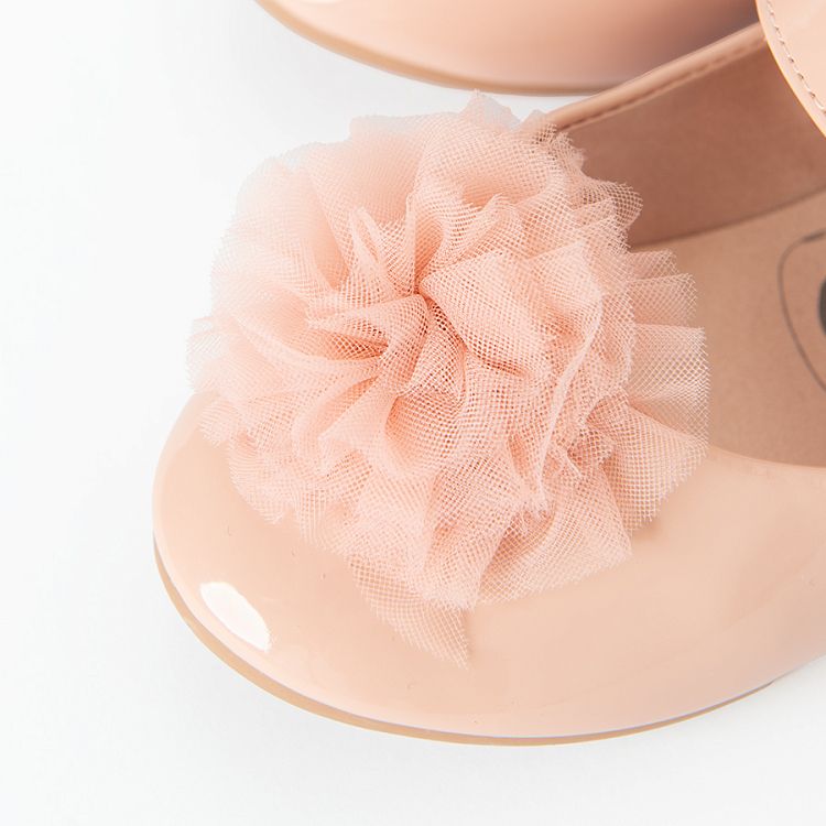 Pink ballerinas with pom pom