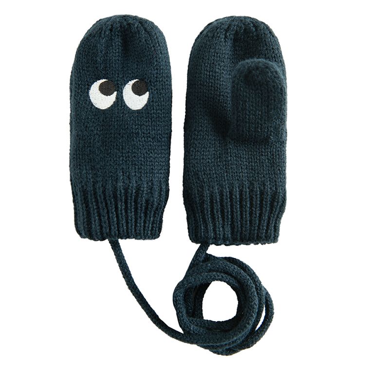 Blue mittens with eyes pattern