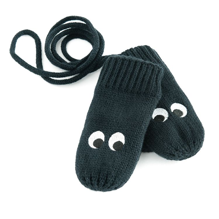 Blue mittens with eyes pattern