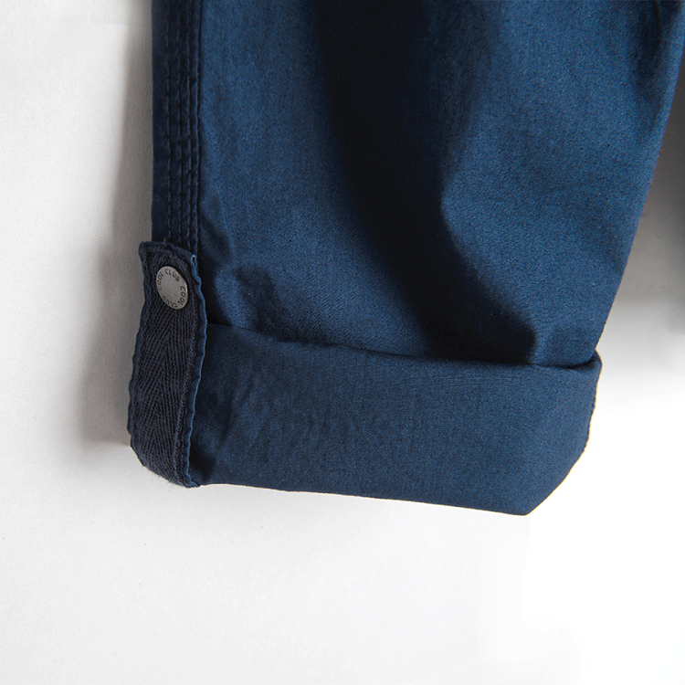 Blue trousers with cord and pockets