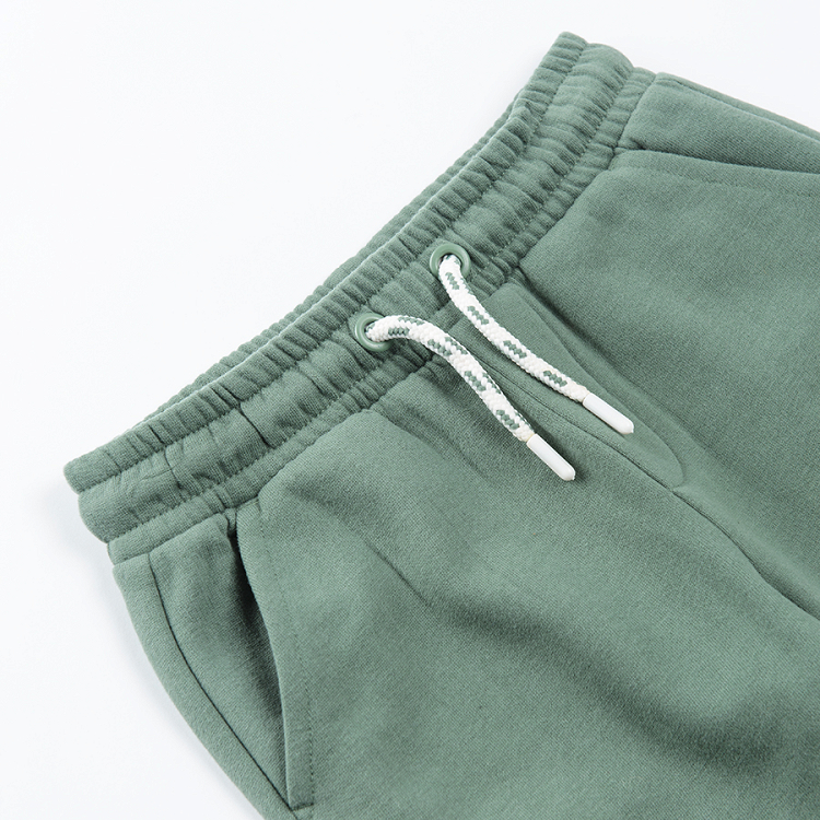 Dark green jogging pants