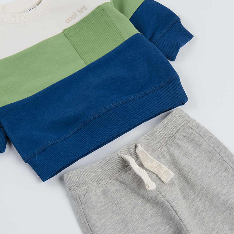 Mix color sweatshirt and grey pants with adjustable waist