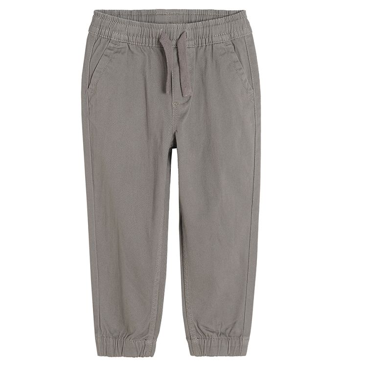 Grey trousers with adjustable waist