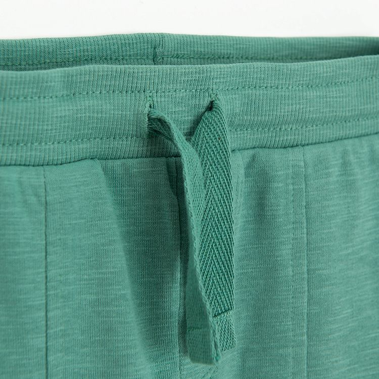 Green jogging pants