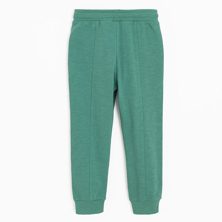 Green jogging pants