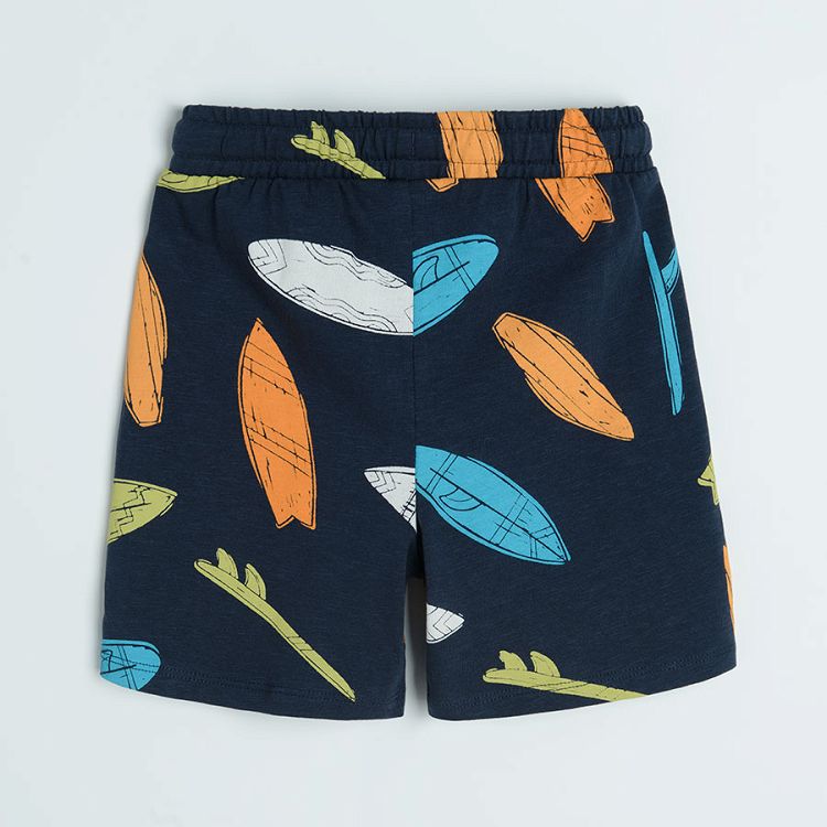 Blue shorts with surf boards print