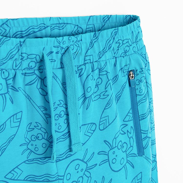 Light blue shorts with cord waist and crabs print