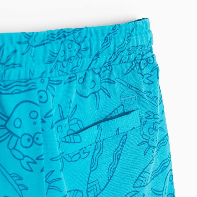 Light blue shorts with cord waist and crabs print