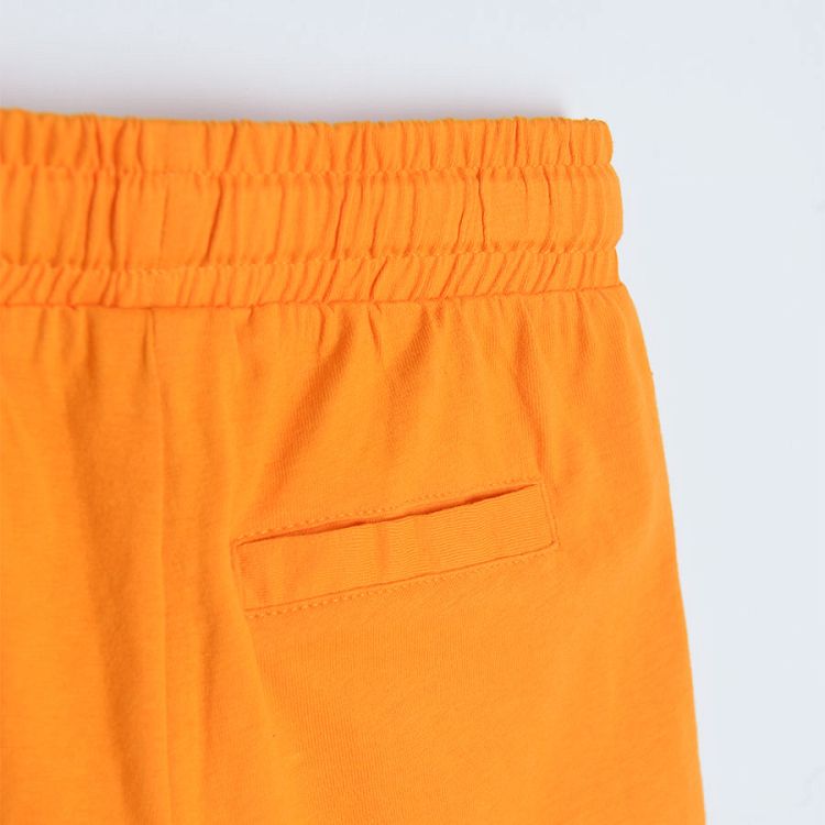 Orange shorts with adjustable waist and pockets