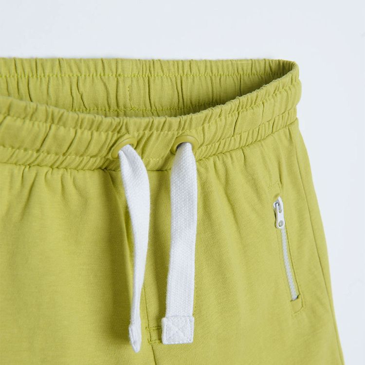 Green shorts with adjustable waist and pockets