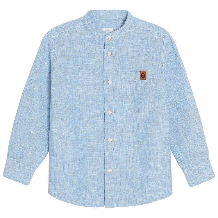 Light blue denim long sleeve button down shirt that rolls up to a button