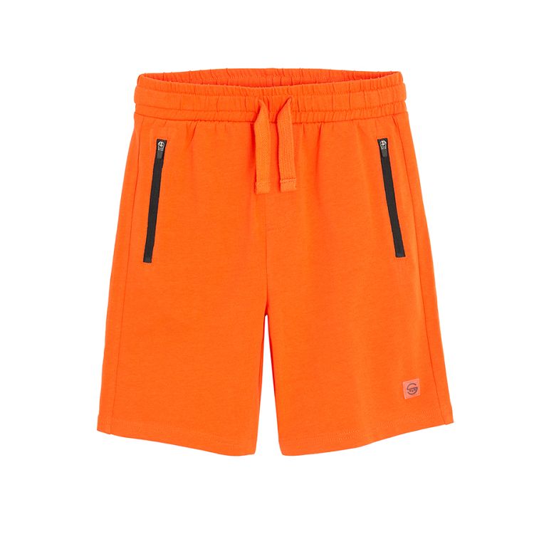 Orange bermuda shorts with cord on the waist