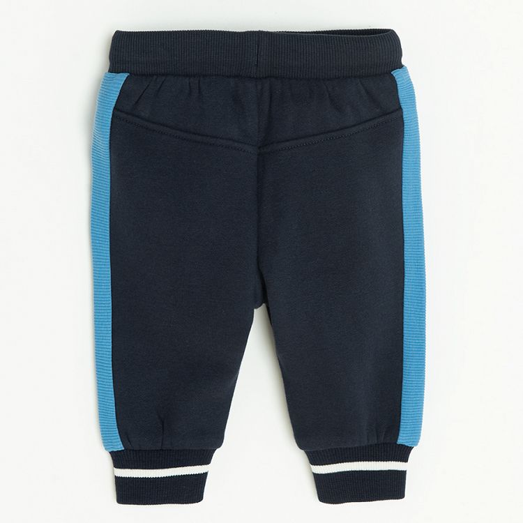 Blue grey jogging pants with blue stripe on the side