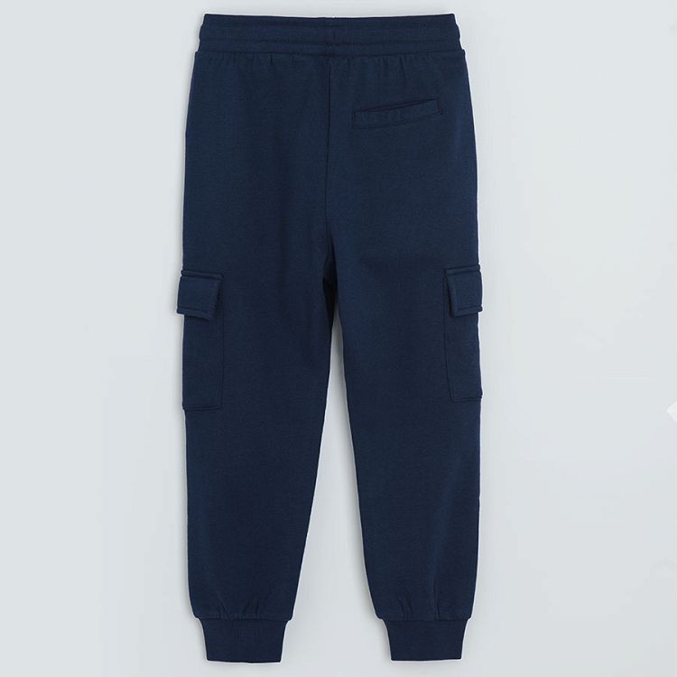 Navy blue jogging pants with side pockets and adjustable waist