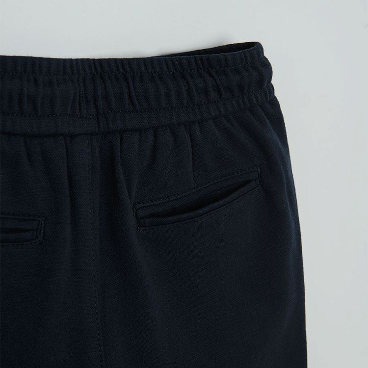 Black trousers with adjustable waist