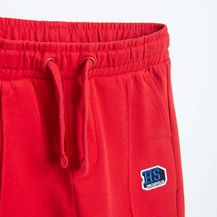 Red jogging pants