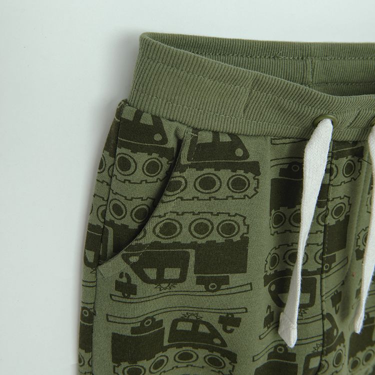 Green jogging pants with trucks print