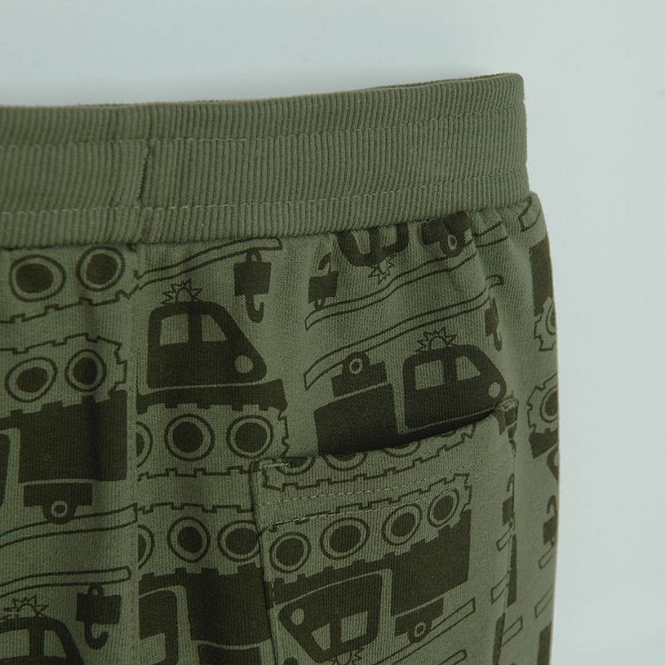 Green jogging pants with trucks print