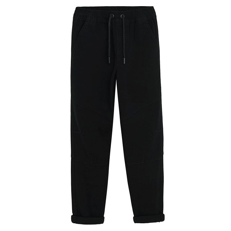 Black trousers with elastic cord on the waist