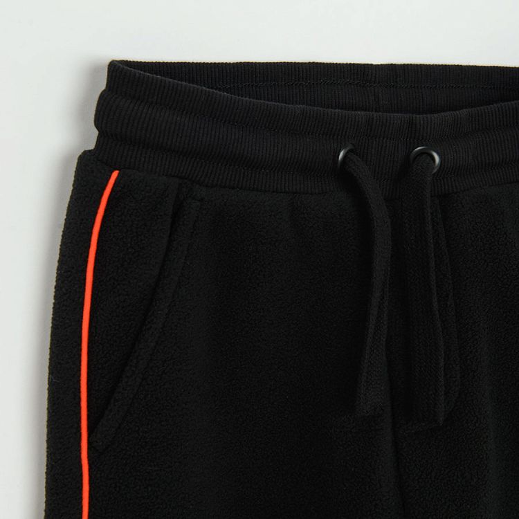 Black jogging pants with orange side stripe Coolclub Israel