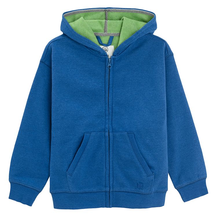 Blue zip through sweatshirt with fluo green lining on the hood