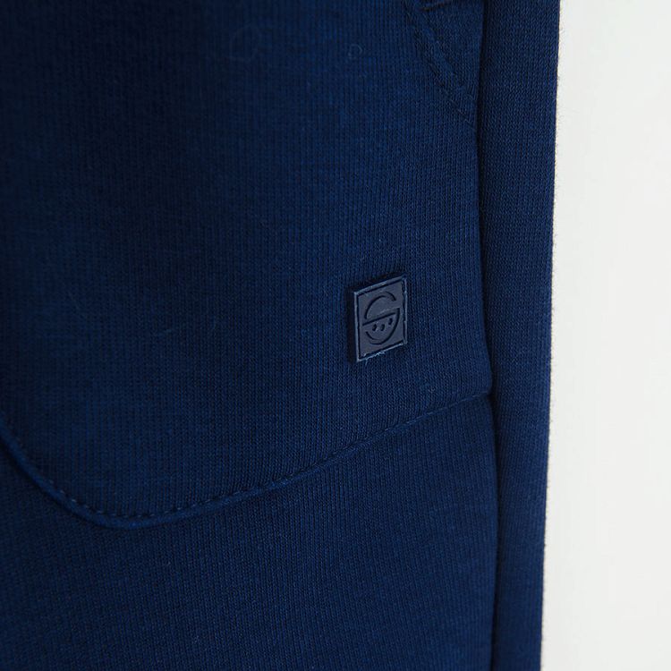 Blue jogging pants with cord on the waist