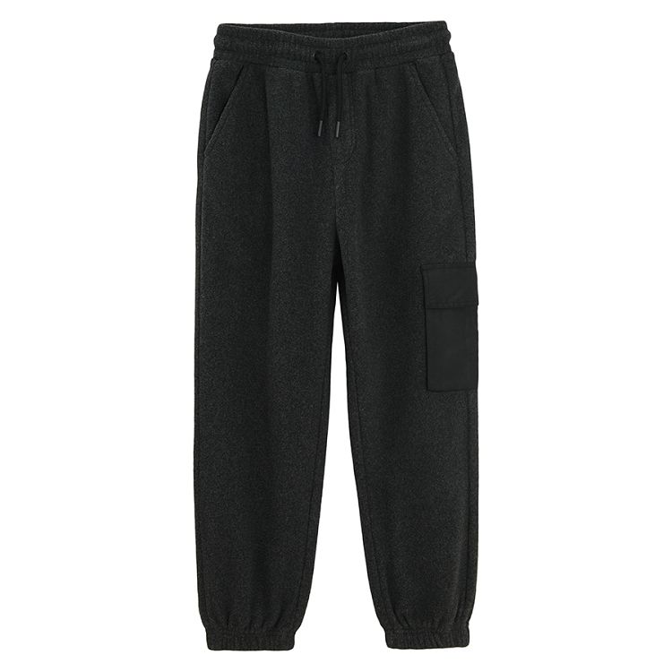 Grey jogging pants with pocket on the left leg