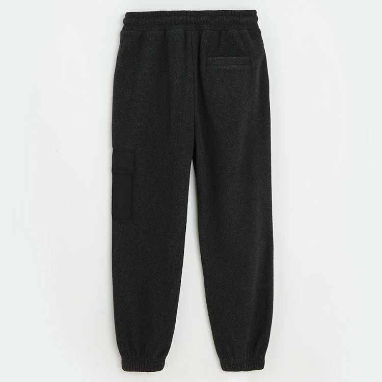 Grey jogging pants with pocket on the left leg