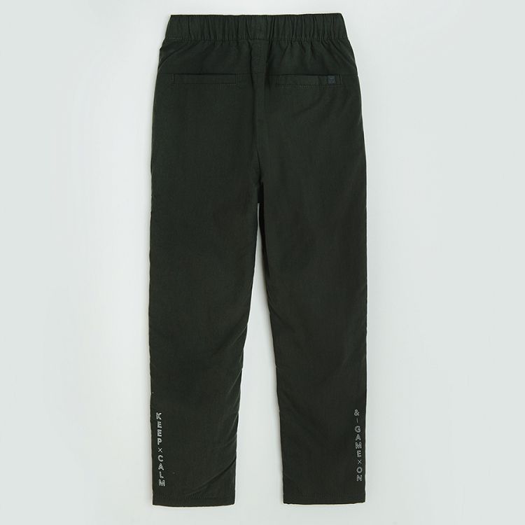 Dark grey trousers with side pockets