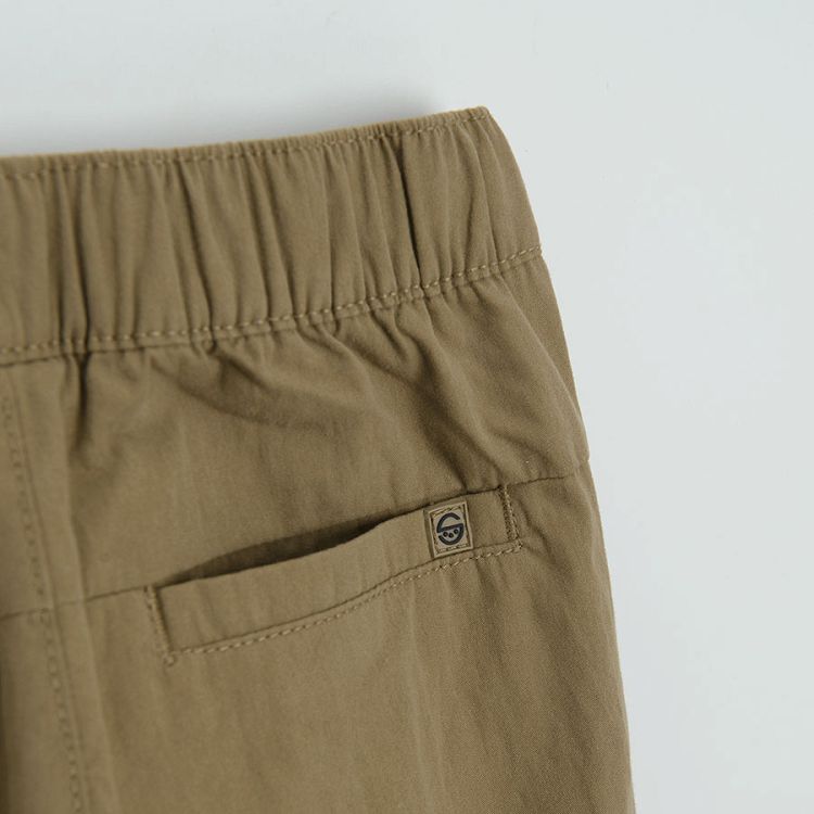 Brown trousers with side pockets