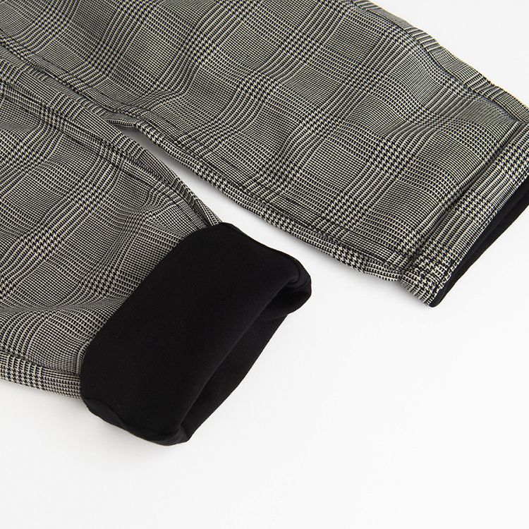 Grey checked trousers