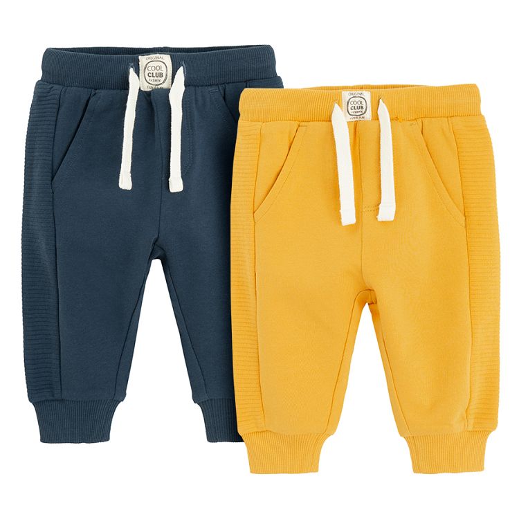 Blue and yellow sweatapants with cord