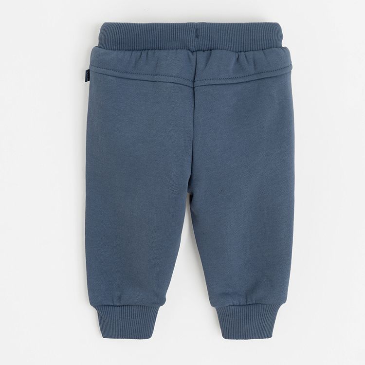 Blue grey jogging pants with funny face print