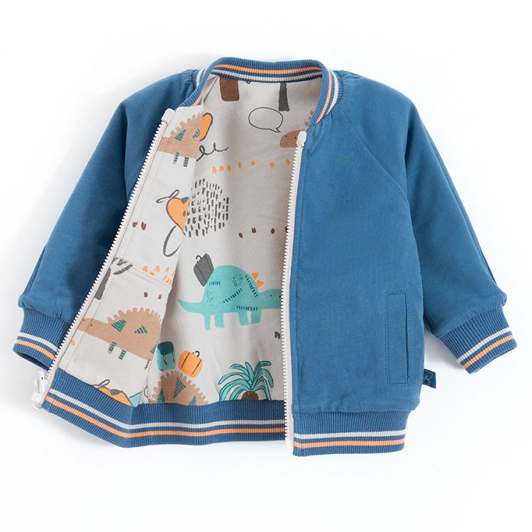 Blue and reversible ecru with dinosaurs print zip through sweatshirt