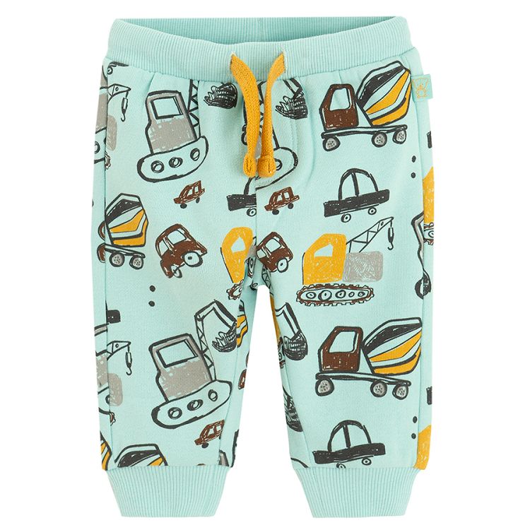 Light blue sweatpants with cord and various trucks print