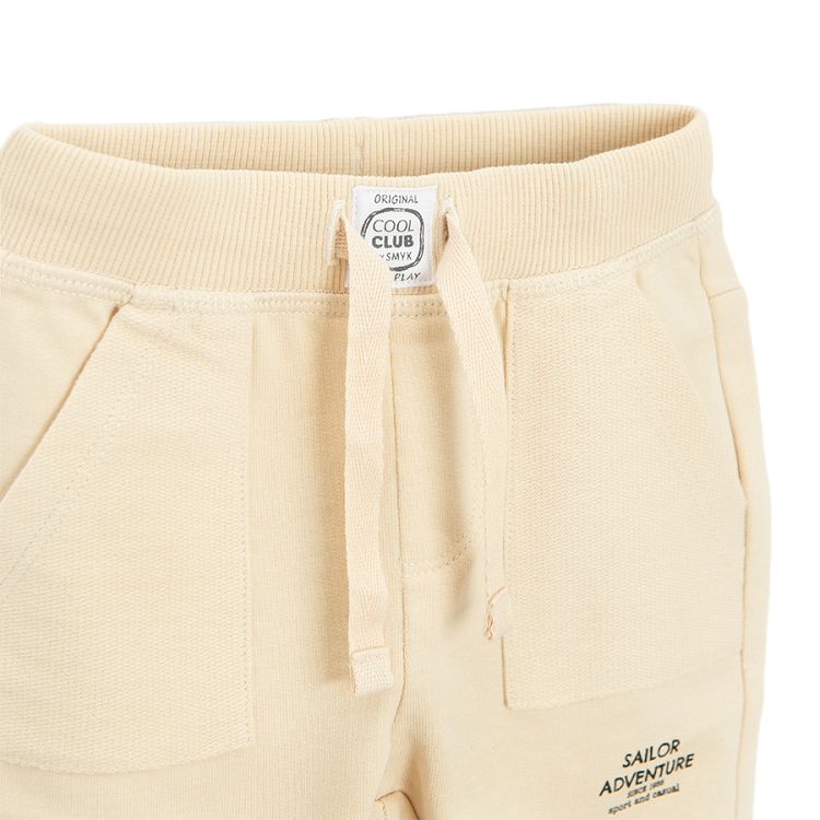 Beige jogging pants with cord