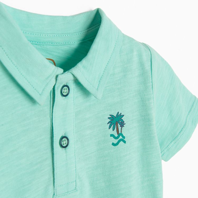 Turquoise polo T-shirt with Born to Surf print on the back