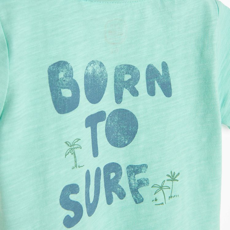 חולצת פולו בצבע טורקיז עם הדפס 'Born to Surf' בגב