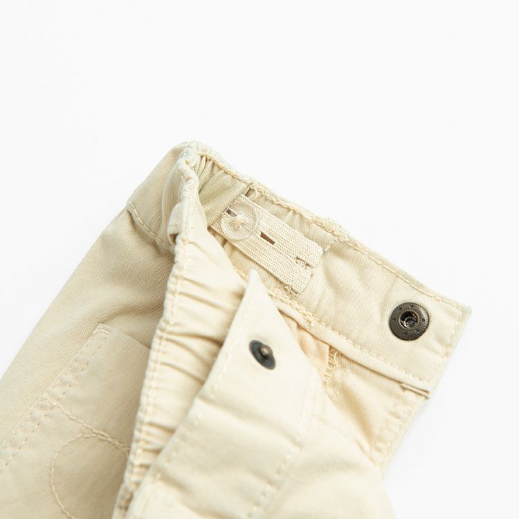 Beige trousers