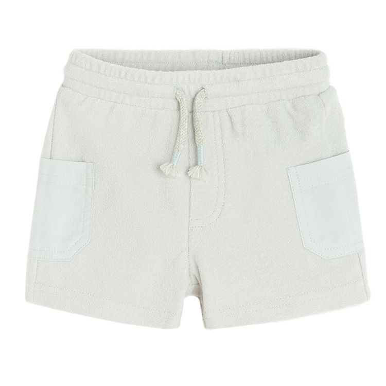 Light grey shorts with side pockets