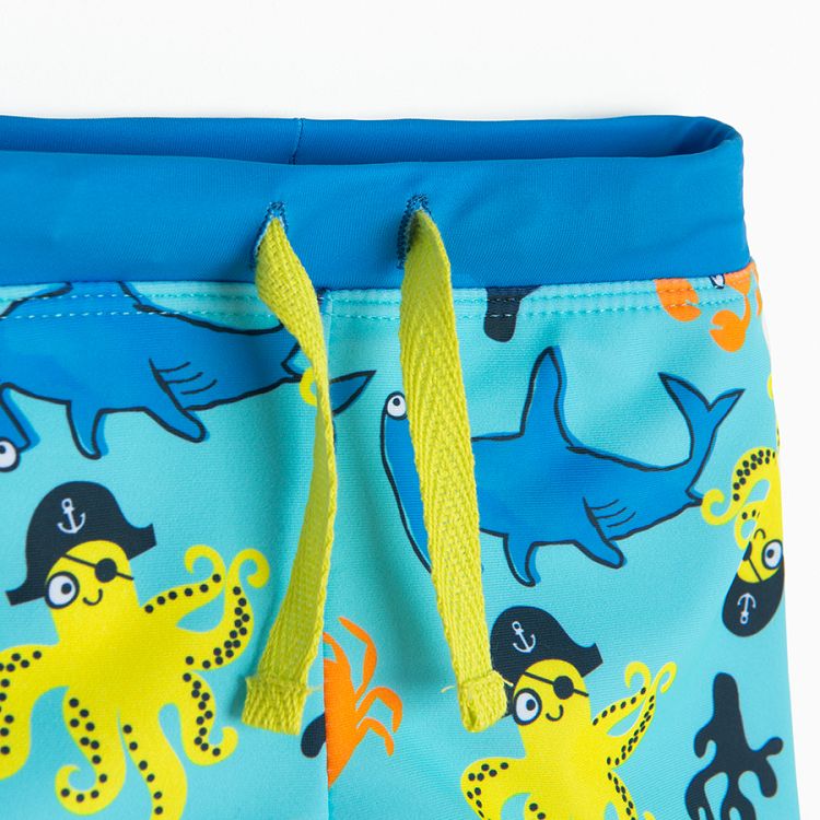 Light blue swim trunks with sea life print