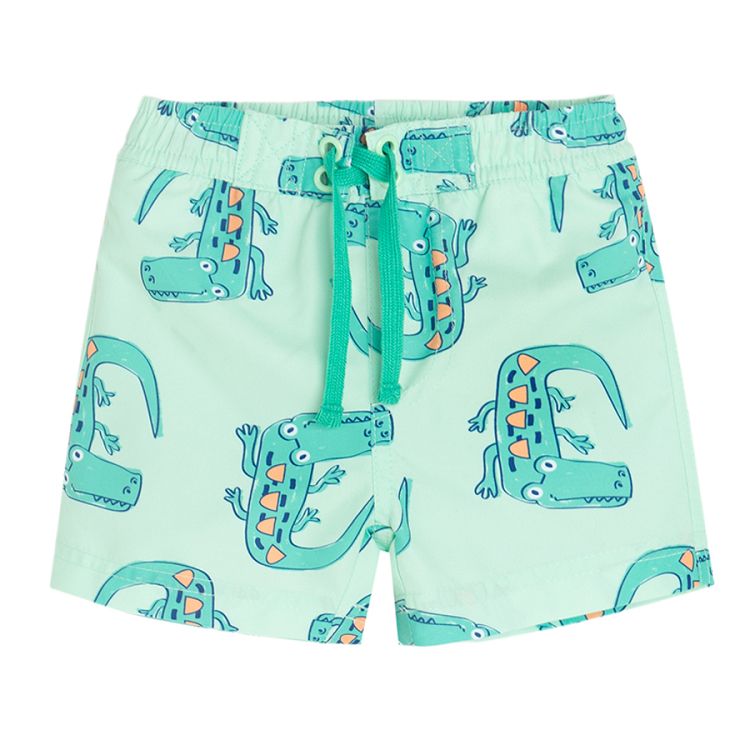 Lime swim trunks with crocodiles print