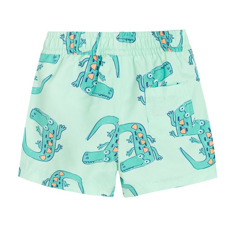 Lime swim trunks with crocodiles print