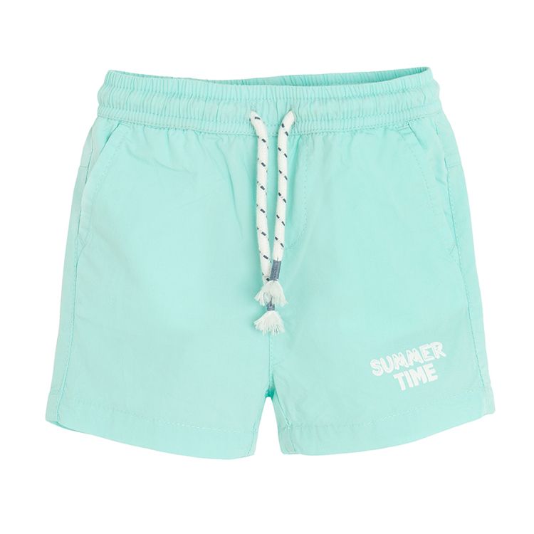 Light turquoise shorts with cord on the waist