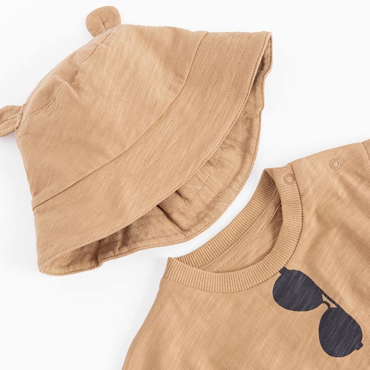 Short sleeve bodysuit with side pockets and sunglasses print and matching hat with bear ears- 2 pieces