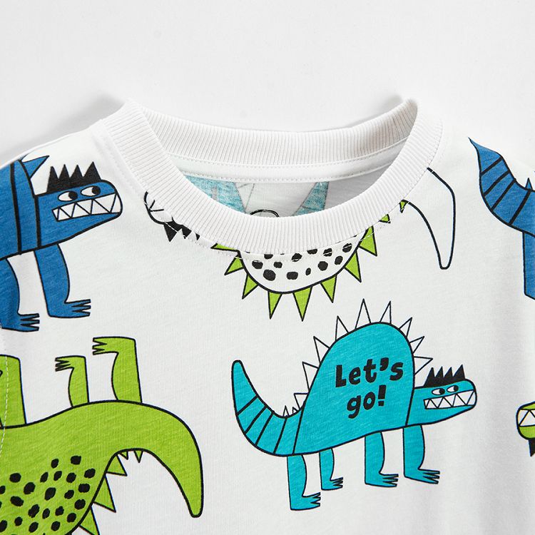 White short sleeve T-shirt with green and blue dinosaurs print