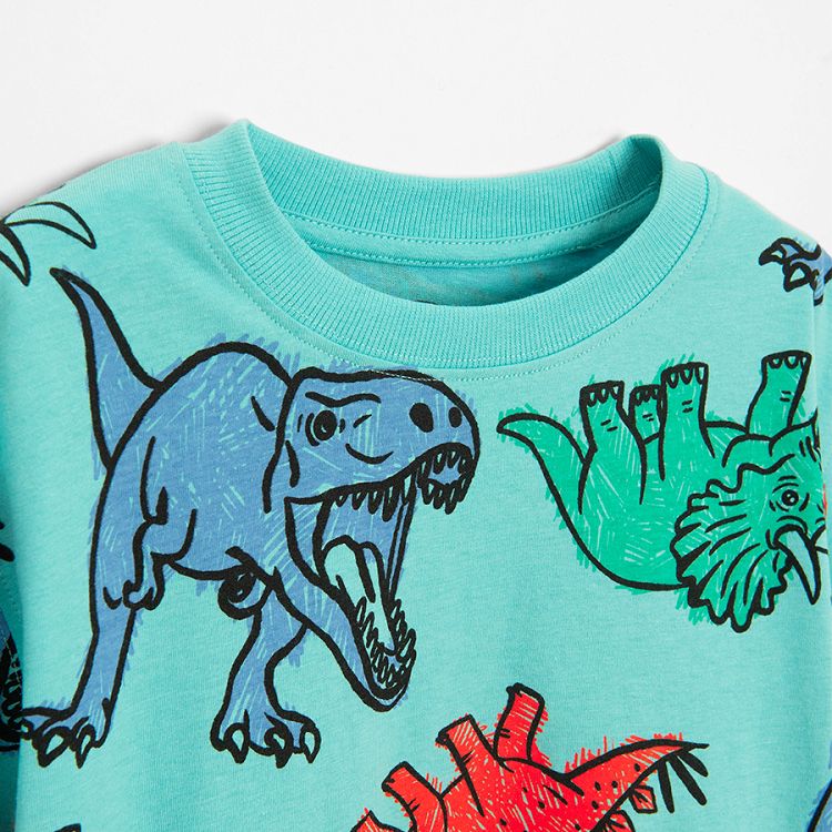 Turquoise T-shirt with dinosaurs print