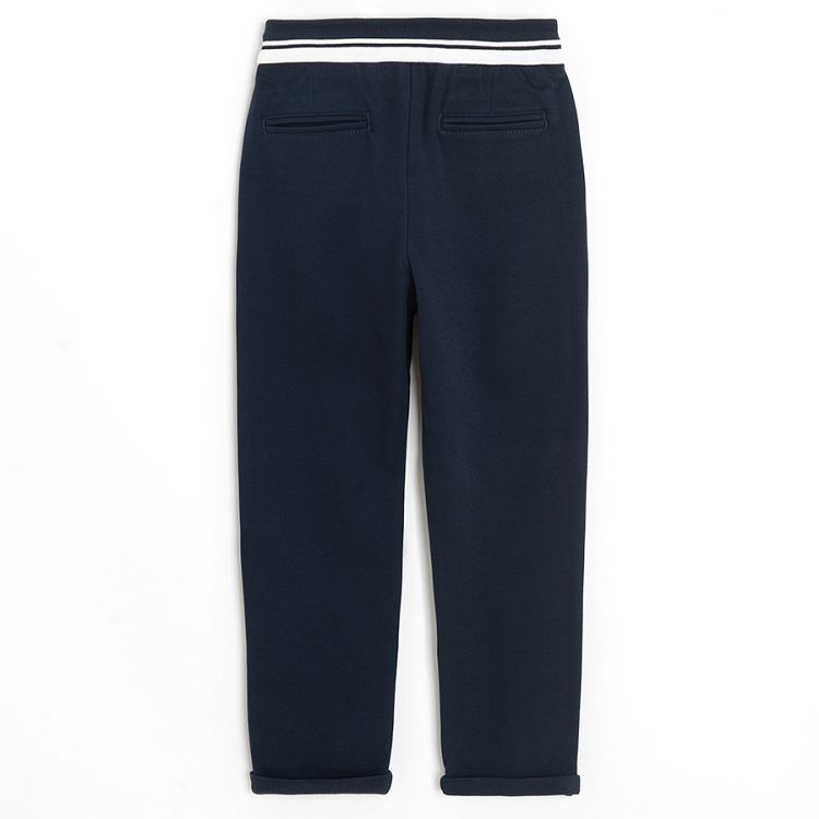 Dark blue trousers with cord