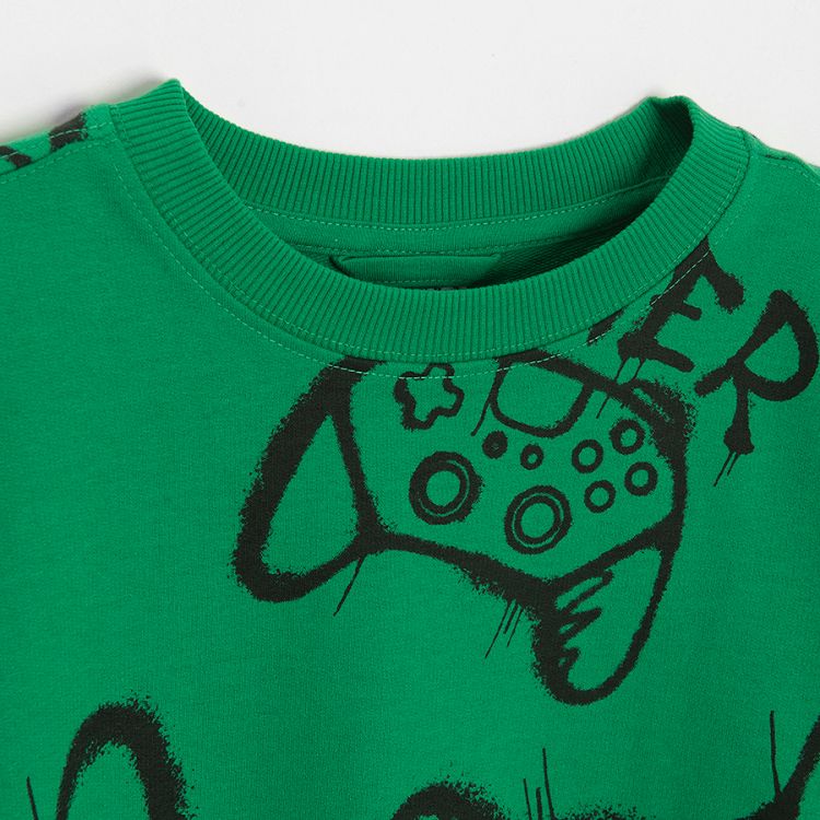 Jogging set, green sweatshirt with gaming print and black sweatpants