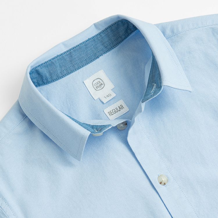 Light blue long sleeve button down shirt